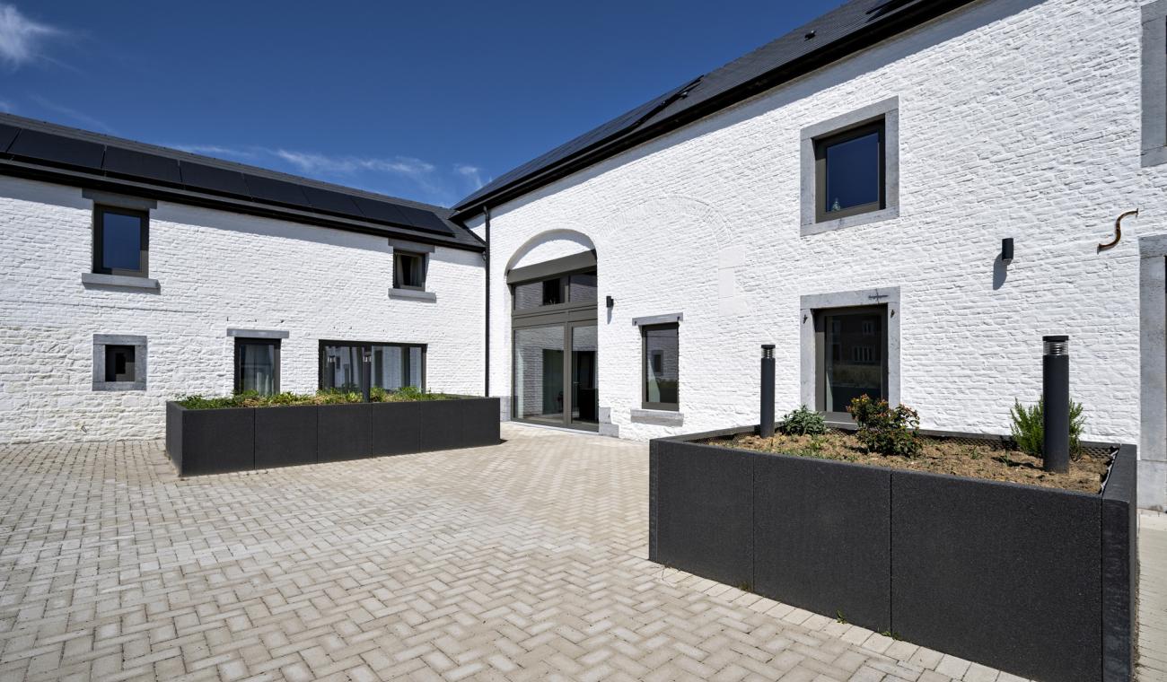 Métamorphose d'une grange en un complexe d'appartements